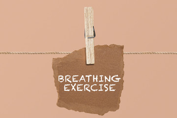 breathing exercise single word on cardboard latched. in coronavirus