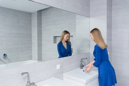 Young Woman In Bathroom