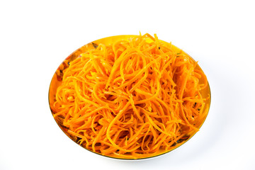 top view of Korean-style carrots Koryo-saram, spicy pickled carrot in bowl isolated on white background.