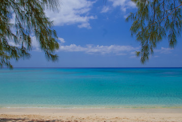 A section of Seven Mile Beach on Grand Cayman in the Cayman Islands. This tropical Caribbean island paradise is a hot spot for affluent tourism 