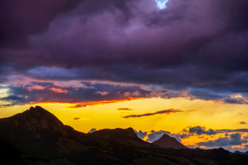 Cloudy, Sunset over Mountains