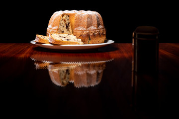 Cake, raisins, black background 05