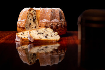 Cake, raisins, black background 02