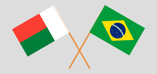 Crossed flags of Madagascar and Brazil