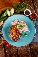 Fried veal or beef ribs and vegetables dipped in sour cream.