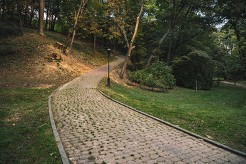 lonely walking way paved road for promenade in city square park landscaping outdoor environment