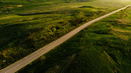 Road at sunset, top view