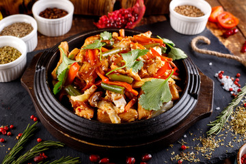 Stir fry chicken, sweet peppers and green beans.