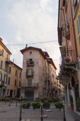 Fototapeta na wymiar Narrow building in Brescia Old Town, Lombardy, Italy.