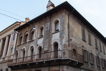 Fototapeta premium Upper facad of medieval building in Brescia Old Town, Lombardy, Italy.