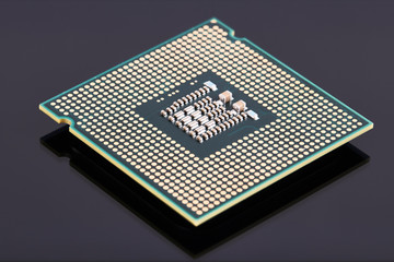 CPU. Production of microchips and processors for electronics. On a dark background. computer industry concept