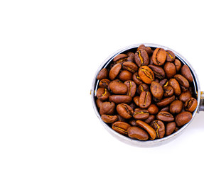 roasted coffee beans in scoop isolated on white background
