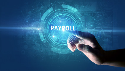 Hand touching PAYROLL button, modern business technology concept