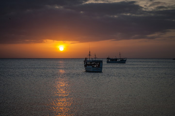 fishing boats at beautiful sunset
