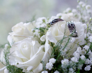 Wedding rings in flower bouquet 