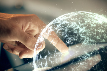 Double exposure of man's hands holding and using a phone and social network theme drawing.