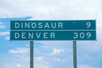 A sign that reads ÒDinosaur 9: Denver 309Ó