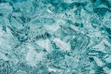 Diamond beach on Iceland or Jokulsarlon Iceberg beach. Crystal ice melting on volcanic beach In Iceland.