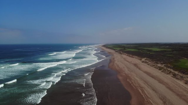 aerial shot of the ocean shore on the fasta