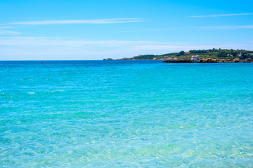 Fototapeta na wymiar Turquoise water in Le Bombarde beach in Sardinia