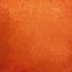 Orange background texture in metal or paper foil vintage textured design, abstract solid halloween or autumn painted material or wall with distressed worn grunge