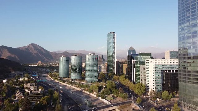 Aerial view of city skyline of Providencia commune district in Santiago, Chile. Cityscape view of high skyscrapers in business and financial district and view of Rio Mapocho.