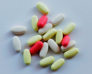 differents kinds of tablets and medicine on a white background