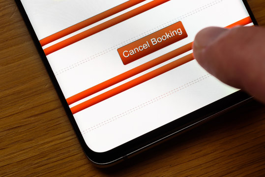 Cancel Booking Text Button On Smart Phone Screen