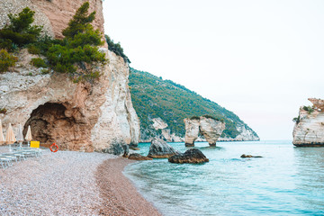 Mattinata Faraglioni stacks and beach coast of Mergoli, Vieste Gargano, Apulia, Italy.