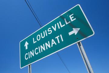 Freeway road sign to Louisville and Cincinnati
