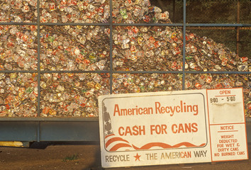 Recycling sign at can collecting site