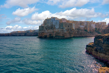 Fototapeta na wymiar View At Ancient City Hanging On The Cliffs of Polignano a Mare, Apulia, Italy