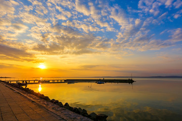 Fototapeta premium Sunset at the pier at lake Balaton, Hungary