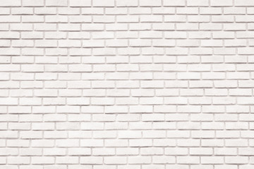 White brick wall background for design and decoration