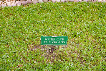 Keep off the grass sign