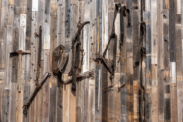 Old rusty tools on a wooden background