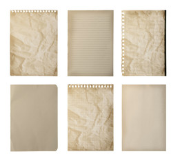 Set of different old notebook papers on white background