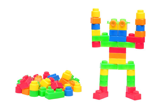 Colorful plastic toys assembled as a robot isolated on white background