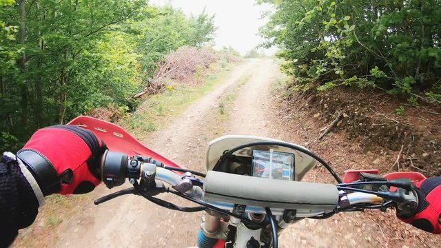 POV drive of biker participating in a motocross