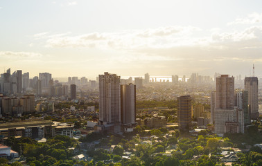 Makati skyline Manila, The Philippines at sunset.