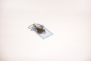 Plastic ID holder isolated against a white background