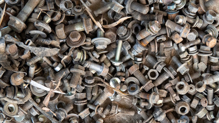 Bolts and old and rusty engine parts