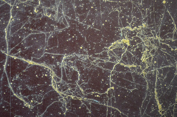 brown iron  texture or background with gold yellow streaks