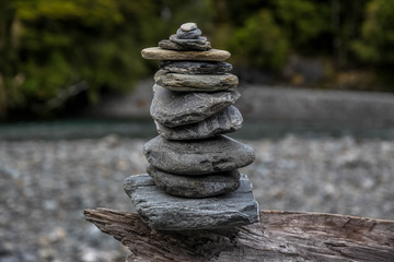 rocks stacked seaside 