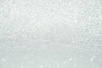 Obraz premium silver and white bokeh lights defocused. abstract background