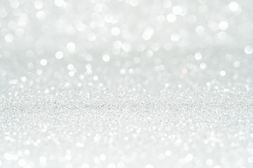 silver and white bokeh lights defocused. abstract background