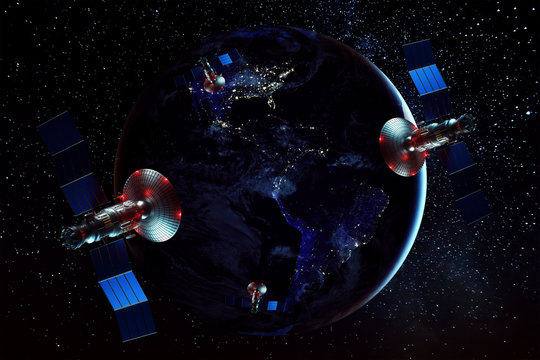 Space satellite with antenna and solar panels in space against the background of the earth. Telecommunications, high-speed Internet, space exploration. copy space. image furnished by NASA
