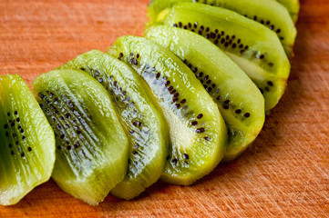 Kiwi sliced. Background for cooking. Fruit. Healthy nutrition, vitamins and vegetarianism.
