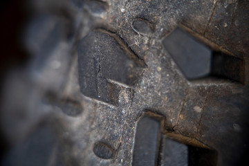 Blurred with a strong increase in the photo of the surface of the dirty tire