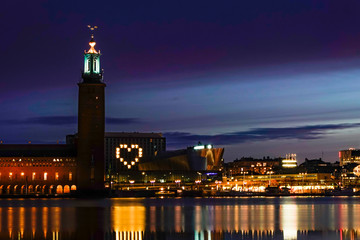 Fototapeta na wymiar Stockholm, Sweden The Stockholm City Hall at dawn and large heart sign.